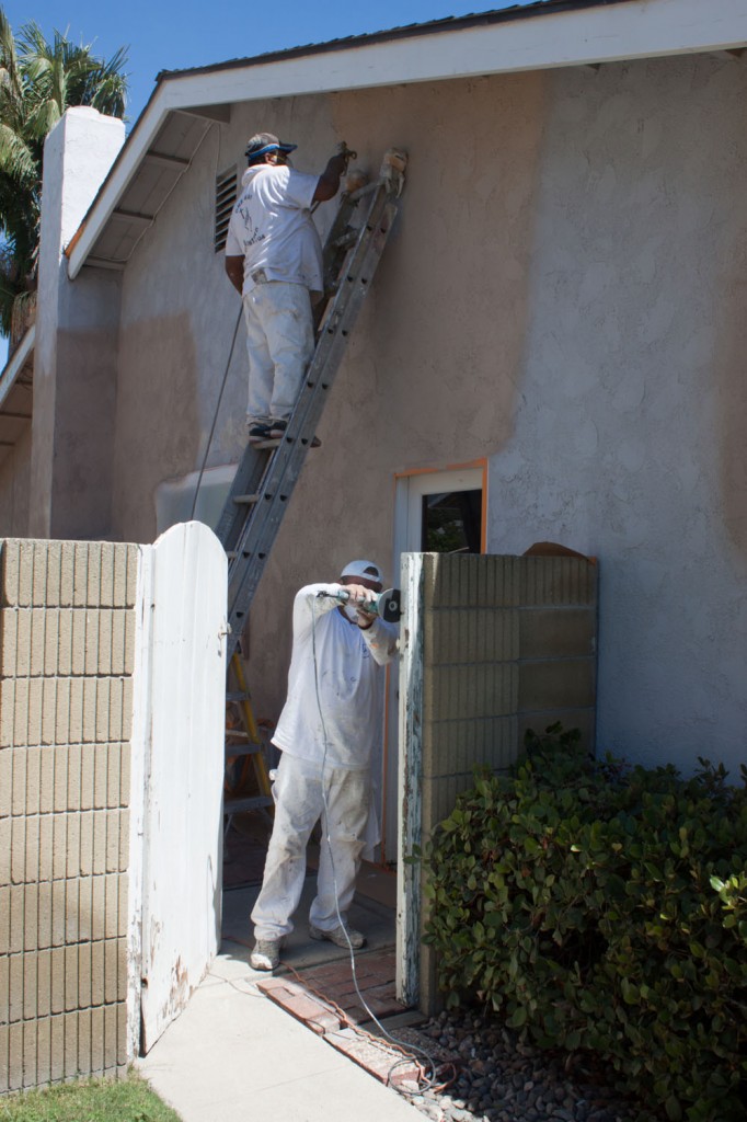Painters of One Way Painting working at Orange County Home 