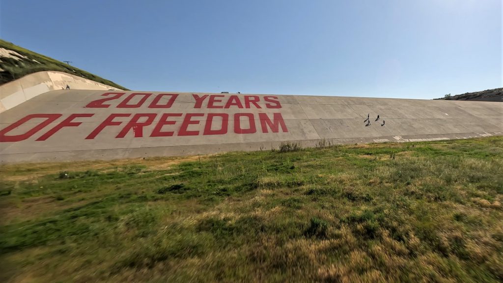 The iconic phrase '200 YEARS OF FREEDOM' was completed at Prado Dam on April 7, 2023