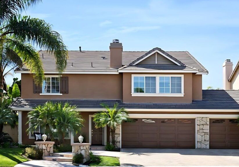 Full exterior painting for a two story home with a lattice patio cover and barbecue pit.