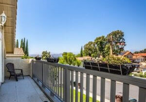 Wooden railing painting in anaheim home.