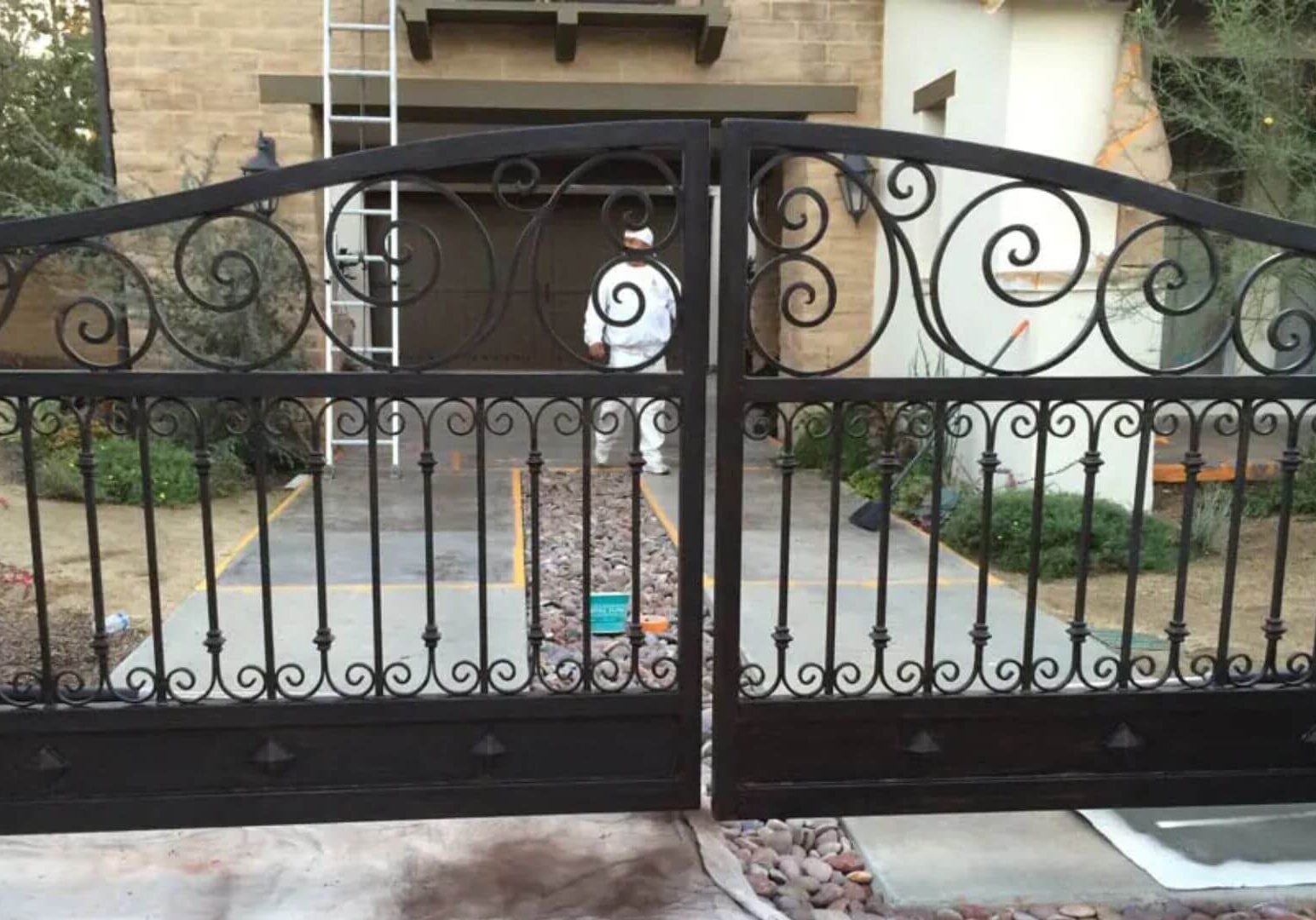 Wrought Iron Gate painted black with a semi-gloss sheen.